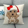 Detail van een linnen kussensloop met een getekende hond met een feestelijke kerstmuts - Puppy met strik kerstmuts (2)