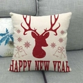 Macro detail of linen pillow cover with red reindeer and Happy New Year print - New Year Red Reindeer Bell (12)