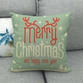 Detail view of green linen Christmas pillow cover with red reindeer antlers and snowflake - Bean Green Red Antler Wish (17)