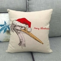 Detail of linen Christmas pillowcase with hand-drawn bird and Merry Christmas text - Christmas Hat Long Beak Bird Style