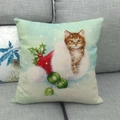 Christmas linen pillow cover featuring a cute tabby cat in a red Santa hat on a gray sofa - Ginger Cat in Christmas Hat (15)