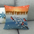 Christmas linen pillowcase with red birds and Merry Christmas text on a sofa - Sunset Pine Forest Red Birds (13)
