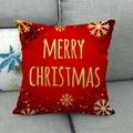 Red linen Christmas cushion cover with golden Merry Christmas text on grey sofa - Red Gold Text Christmas Style (12)