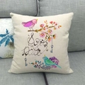Close-up of linen cushion cover featuring hand-painted birds and cherry blossoms print - Save The Date Vintage Key Style (8)