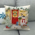 Detailed view of linen Christmas cushion cover with festive snowman and red door prints - 45x45cm / Cat and Snowman Scene (7)