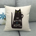 Cartoon black cat linen cushion cover with Me Watching U Humans print on sofa - Black Cat With Text Style