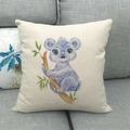 Close-up of watercolor blue koala pattern on textured linen cushion cover on gray sofa - Koala Style (6) / 18x18 Inch