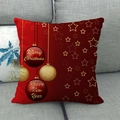 Christmas linen pillowcase with red festive star patterns on a modern grey sofa - Red Star Christmas Ball Style (18)