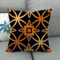 Linen sofa cushion cover with symmetrical orange geometric floral pattern on black base - Black Gold Mandala (1) / 45x45cm