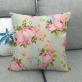 Detail of floral linen cushion cover with pink roses on blue striped fabric on a sofa - 18x18 Inch / Blue White Stripe Rose Cluster Style (12)