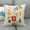 Christmas Noel linen pillowcase with holiday tree and stocking motifs on grey sofa - Christmas NOEL Print (19)