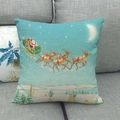 Christmas Santa Claus sleigh on light blue linen pillowcase displayed on grey sofa - Santa Sleigh Moon Night (21)