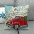 Christmas linen pillowcase featuring a vintage red truck in snow on a grey sofa - 45x45cm / Red Truck Driving in Snow (15)