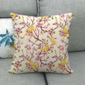 Detailed texture of linen pillowcase featuring plum blossom and yellow birds on a sofa - Off-white Background Pink Cherry Yellow Birds (7)