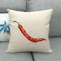 Close-up of linen pillowcase featuring a red chili watercolor print on a sofa - Red Chili Style (6)
