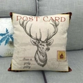 Detailed view of linen Christmas pillowcase featuring vintage stag postcard and plaid border - 18x18 Inch / Stag Style