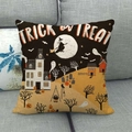 Halloween linen pillowcase with Trick or Treat lettering on a grey fabric sofa - Witch Castle Orange Black White Style (3)