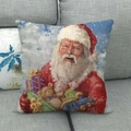 Linen Christmas pillow case featuring Santa Claus with gifts on a grey fabric sofa - Santa Claus Holding Gifts Style (16)