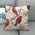Linen cushion cover with watercolor red birds and floral pattern on a gray sofa - Chinese Watercolor Red Birds and Flower Buds (9)