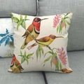 Linen cushion cover with bird and flower print on grey fabric sofa background - Chinese Watercolor Bird with Pink Flowers (3)