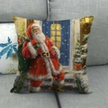Linen Christmas pillow case featuring a Santa Claus print on a gray fabric sofa - Santa Claus at Blue Door Style (20)
