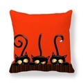 Detailed view of the soft peach skin fabric texture on the Halloween orange cat pillowcase - Three Peeking Black Cats (Style 11) / 18x18 Inch