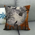 Detail of linen Halloween pillow cover with cemetery scene and bats on a grey sofa - 18x18 Inch / Halloween Cemetery Bats and Raven Style (5)