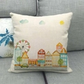 Linen cushion cover with colorful hand-painted city landscape on a grey sofa - Nordic Town Buildings (11)