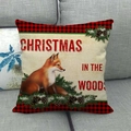 Weihnachts-Kissenbezug aus Leinen mit Fuchsmotiv und Karomuster auf einem grauen Sofa - Fuchs-Muster (2)