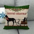 Detail of Country Christmas linen pillowcase with vintage carriage on a grey sofa - Vintage Carriage (9)