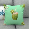 Green linen throw pillow cover with kiwi fruit juice print on a grey sofa - Kiwi Fruit Summer Drink (17)