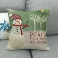 Christmas snowman cushion cover with PEACE on Earth text and forest silhouette - Peace On Earth Snowman With Glasses Style