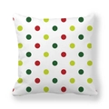 Detail of Christmas peach skin pillowcase featuring festive red and green polka dots - White Background Colored Polka Dots