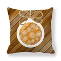 Close-up of snowflake Christmas ornament print on wood texture peach skin cushion - Diagonal Wood Grain White Ornaments