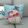 Linen Christmas snowman pillowcase shown on a gray sofa for winter home decor - Hugging Snowmen Warm Winter Style (9)