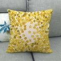 Square linen cushion cover with bright yellow star patterns on a grey fabric sofa - Beige Yellow Dense Stars (14)
