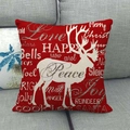 Detail of red linen Christmas pillow cover with white reindeer silhouette and holiday text - Red Reindeer Merry Christmas (12)