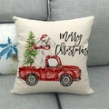 Detail of Christmas linen pillowcase with red truck and dog design on a grey sofa - Red Truck And Dog In Santa Hat(6)