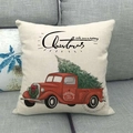 Linen Christmas pillowcase detail with vintage red truck and tree on grey sofa - Red Truck and Christmas Tree Farm