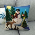 Christmas snowman and animals illustration on linen pillowcase over a grey sofa - Snowman Moonlit Night Animals
