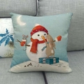 Linen Christmas pillow case featuring a cute snowman and rabbit on a grey sofa - Snowman and Rabbit Decoration