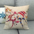 Linen Christmas pillow case featuring two snowmen with red birds on a grey sofa - Double Snowmen & Red Bird