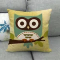 Close-up of linen fabric texture and cartoon owl design on a square throw pillow cover - Cyan Cartoon Owl Style (25)
