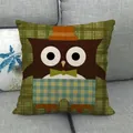 Detail of cartoon owl linen pillow cover showing the woven texture on a grey sofa - Hat and Bowtie Owl Style (28)