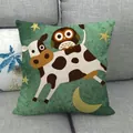Linen cushion cover with cartoon cow and owl illustration on gray sofa - Cow Carrying Owl Style (31)