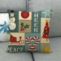 Housse de coussin de Noël en lin avec bonhomme de neige et sapin sur canapé gris - Cheer Peace Sarcelle Bonhomme de Neige (11)