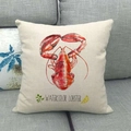 Close-up of linen pillow cover featuring a watercolor lobster print on a gray sofa - Watercolor Red Lobster (13)
