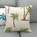 Detail of linen cushion cover with tropical coconut tree print on a grey sofa - Tropical Coconut Tree Style (5)