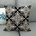 Linen cushion cover with black and white mandala patterns on a grey sofa - Vintage Mandala Style (6)