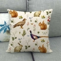 Detailed close-up of a linen pillow cover featuring vintage forest animal and plant prints - Forest Vintage Animals Style (7)